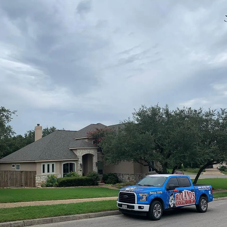 Slide of Roland's Roofing