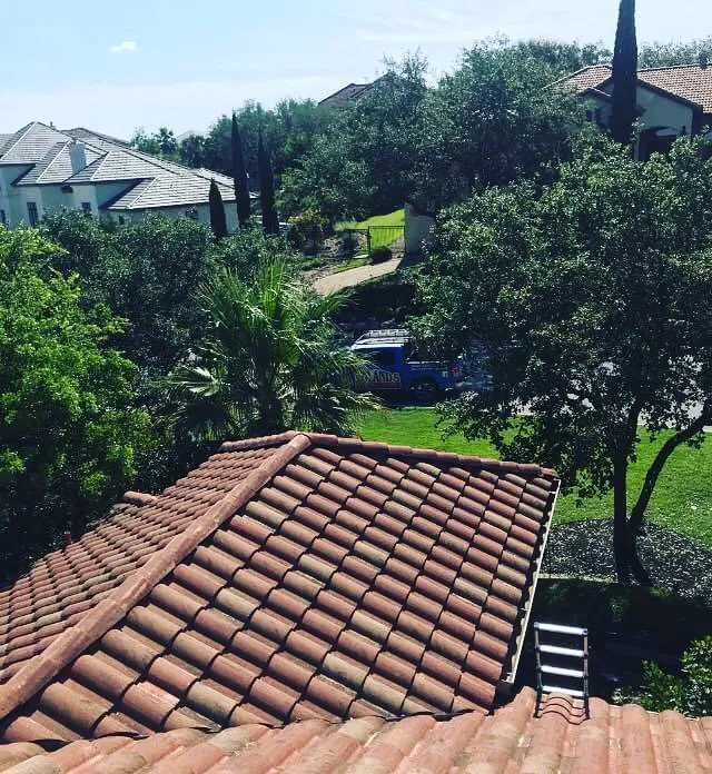 Slide of Roland's Roofing