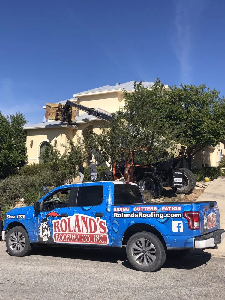 Slide of Roland's Roofing