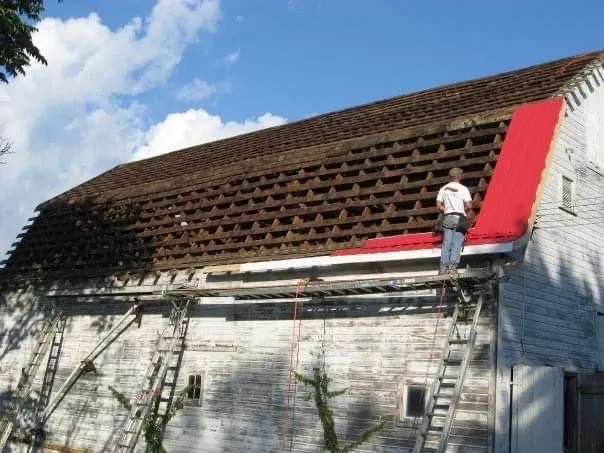 Professional roof repair same-day service across Carmichaels, PA - Romanakis Construction