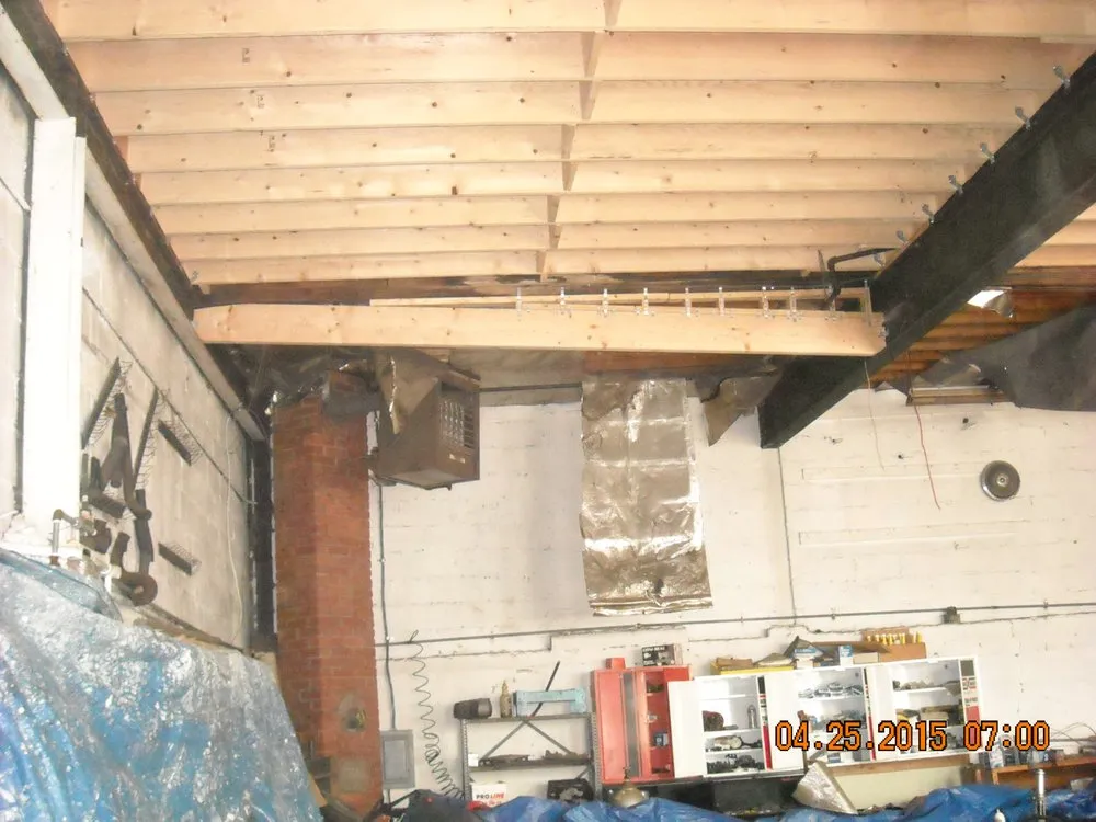 Slide of Romanelli Roofing