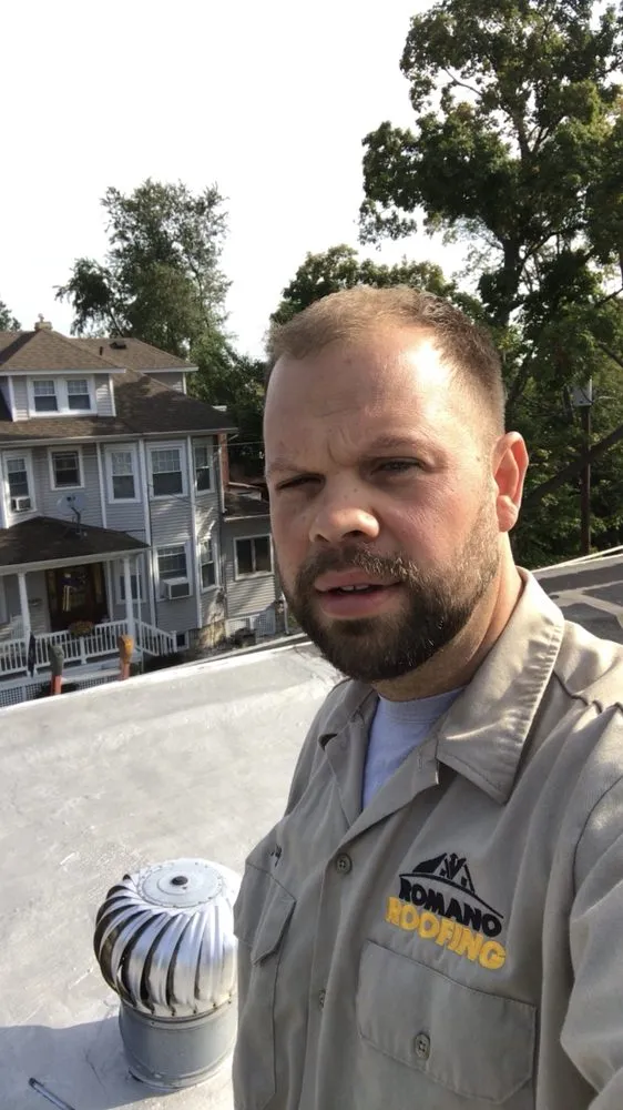 Slide of Romano Roofing