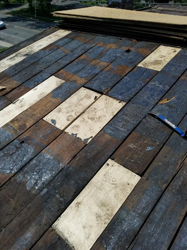 Slide of Romano Roofing