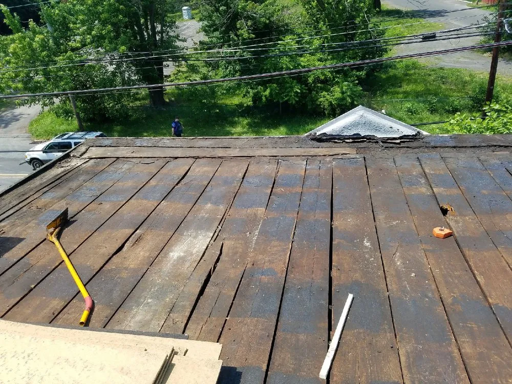 Slide of Romano Roofing