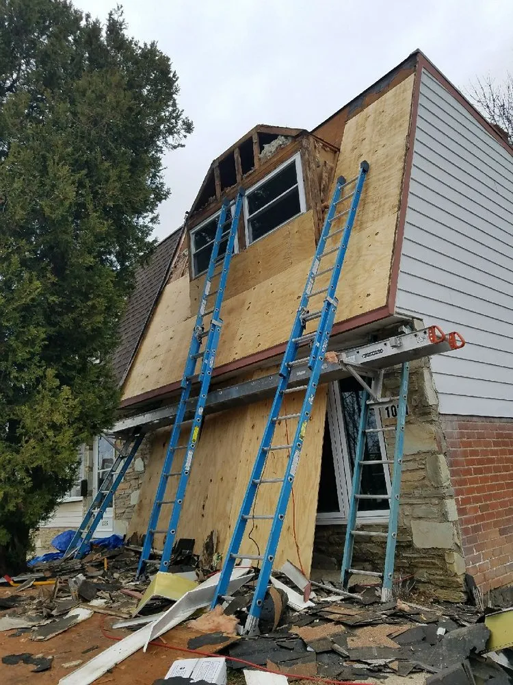 Slide of Romano Roofing