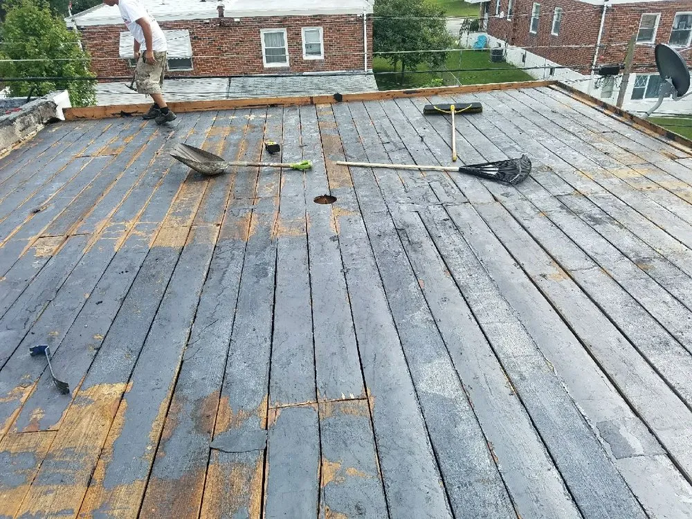 Slide of Romano Roofing