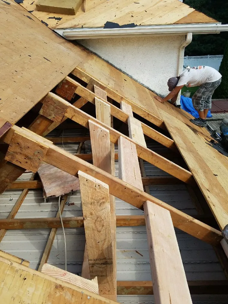 Slide of Romano Roofing