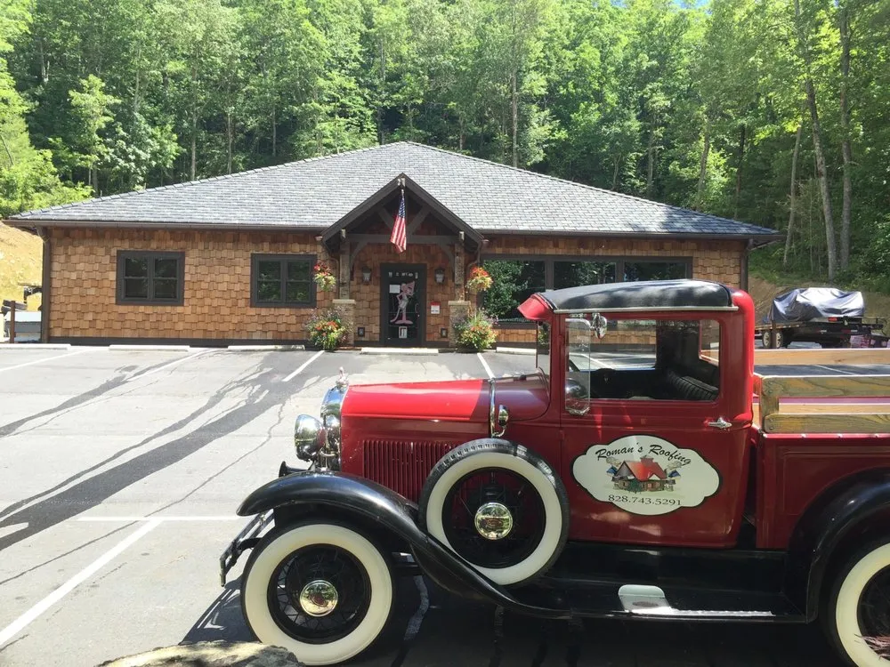 Slide of Roman's Roofing