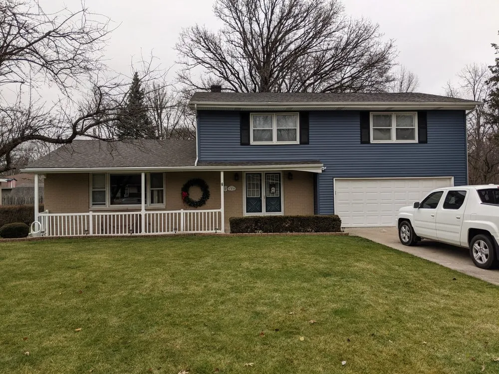 Slide of Roman's Roofing