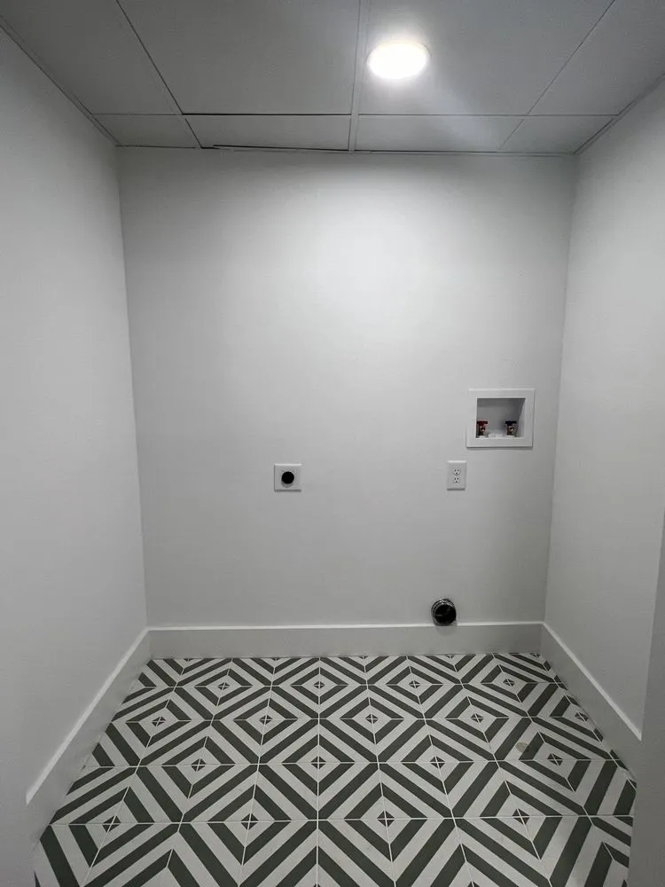 Slide of Romeros Quality Construction