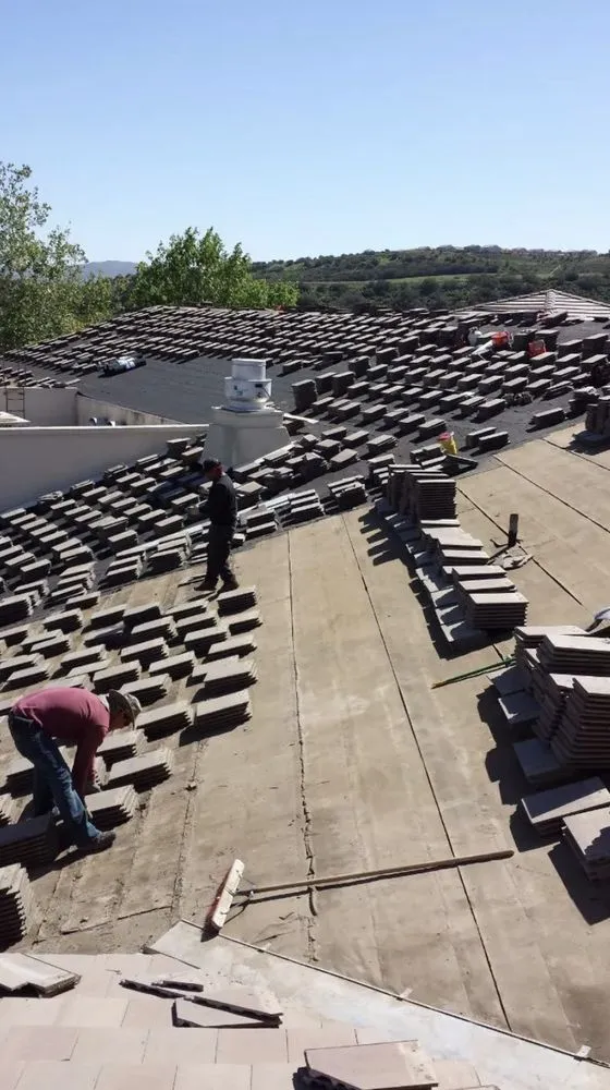 Slide of Romero's Roofing