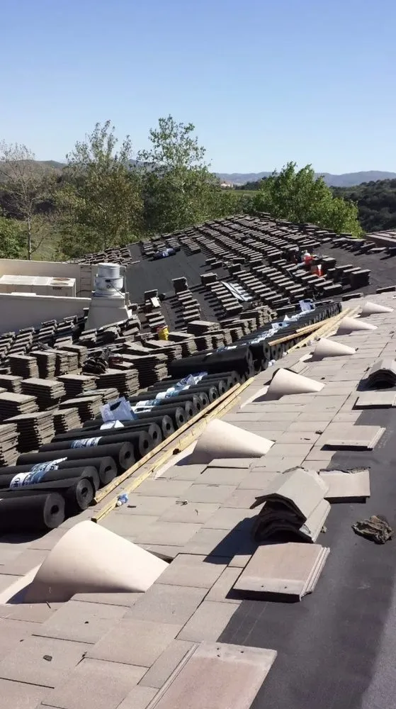 Slide of Romero's Roofing