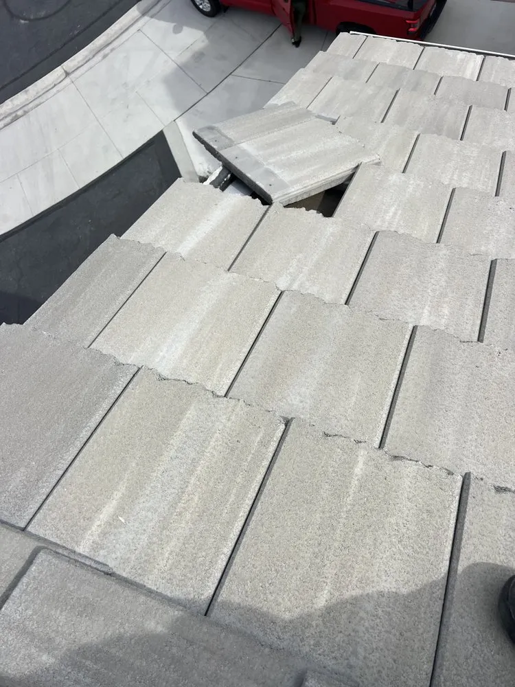 Slide of Romer’s Roofing