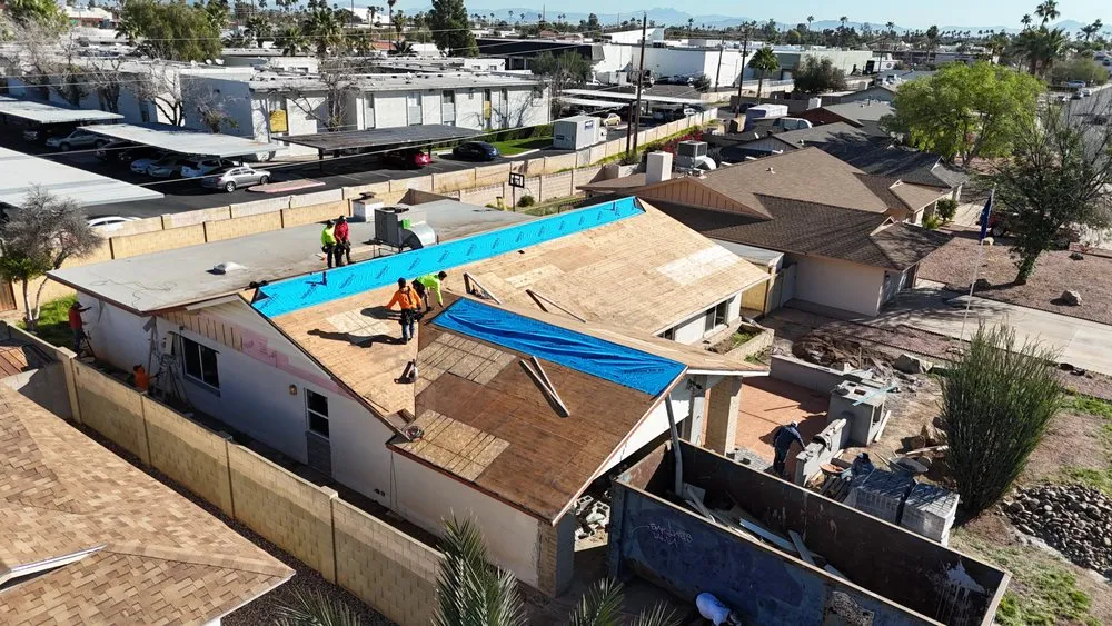 Slide of Romney Roofing