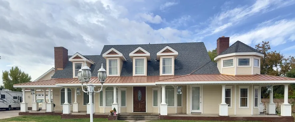 Slide of Romney Roofing