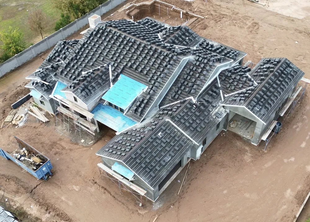 Slide of Romney Roofing