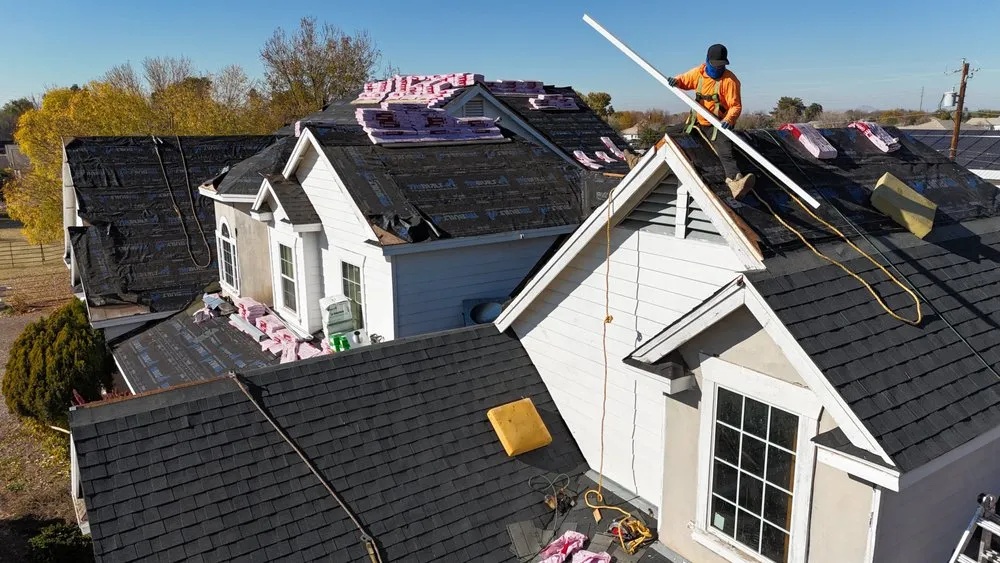 Slide of Romney Roofing