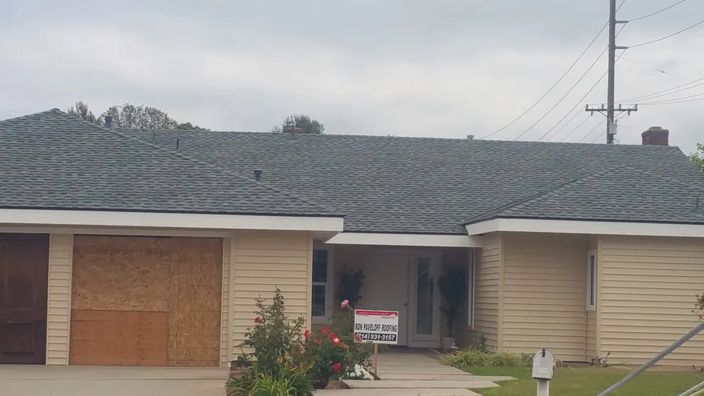 Slide of Ron Paveloff Roofing