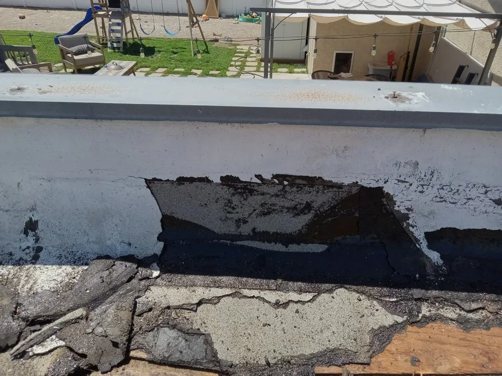 Slide of Ronald's Roofing