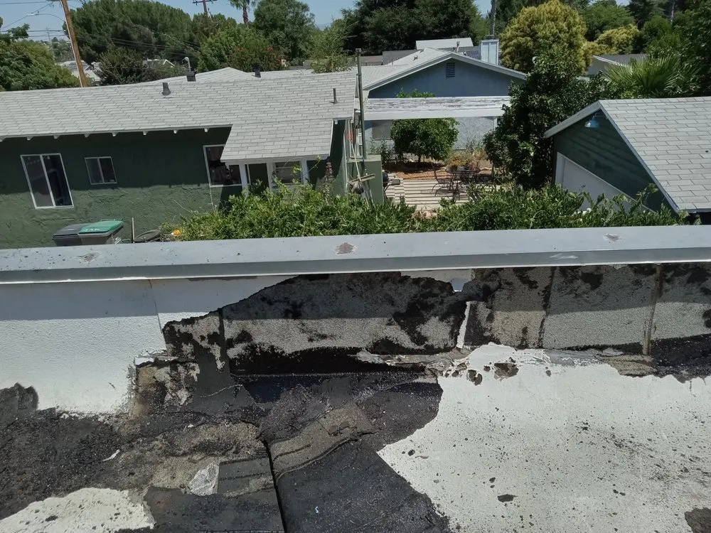 Slide of Ronald's Roofing