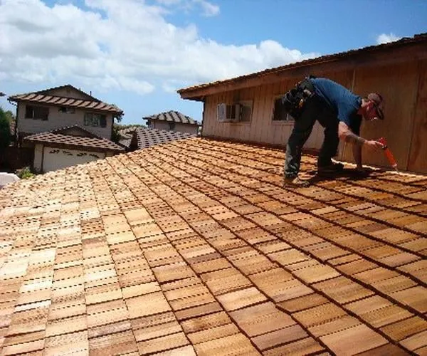 Slide of Rons Roofing and Restorations