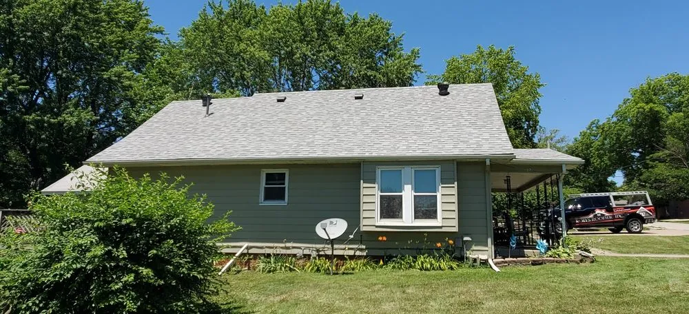 Slide of Ron's Roofing