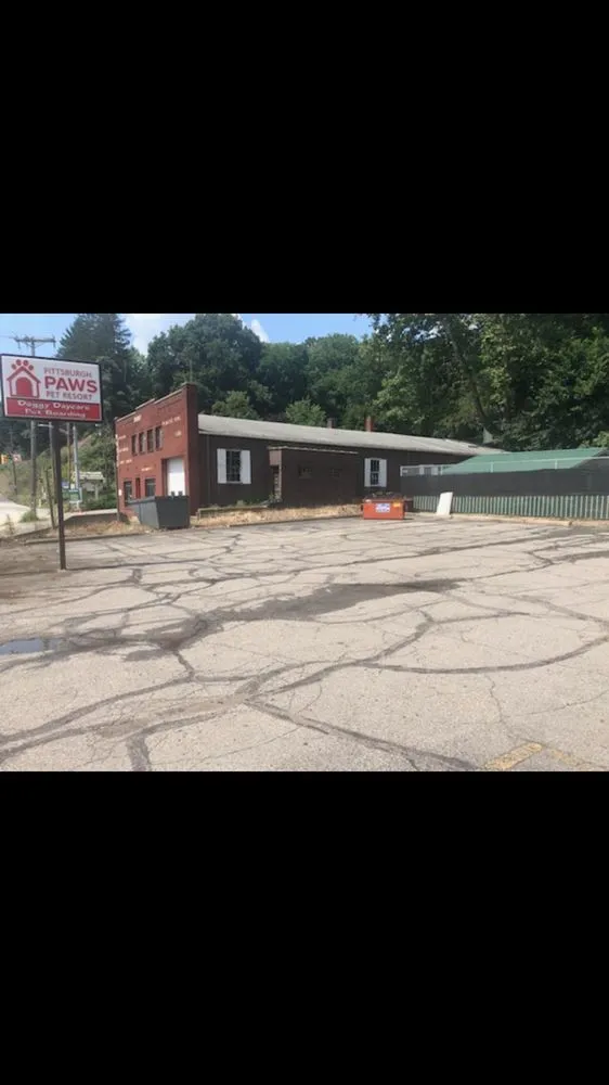 Slide of Roof & Driveways R Us