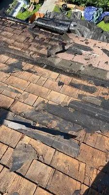 Roof & Home Construction Logo