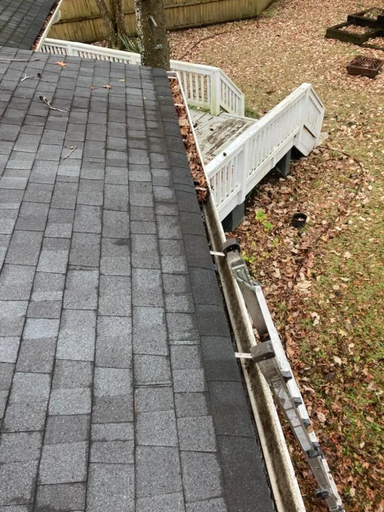 Slide of Roof and Gutter Cleaning