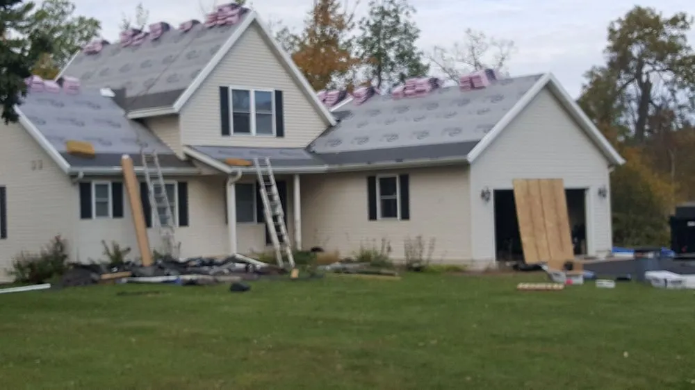 Slide of Roof Armor Roofing & Construction