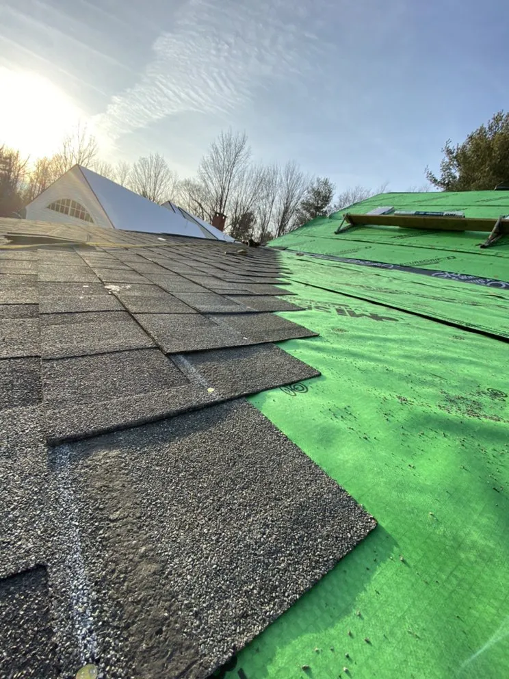 Slide of Roof Chasers Construction