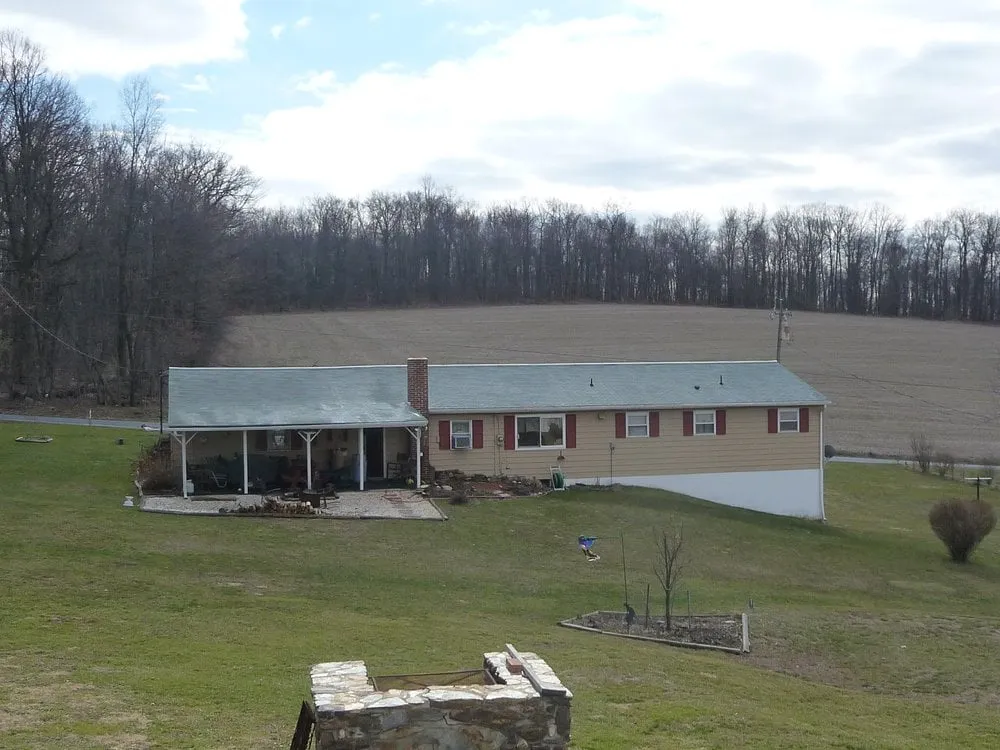 Slide of Roof Cleaning By A&E