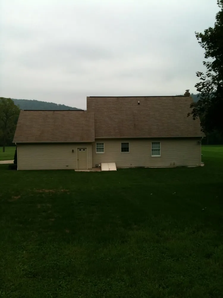 Slide of Roof Cleaning By A&E