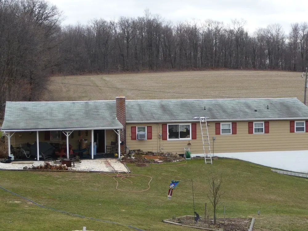 Slide of Roof Cleaning By A&E