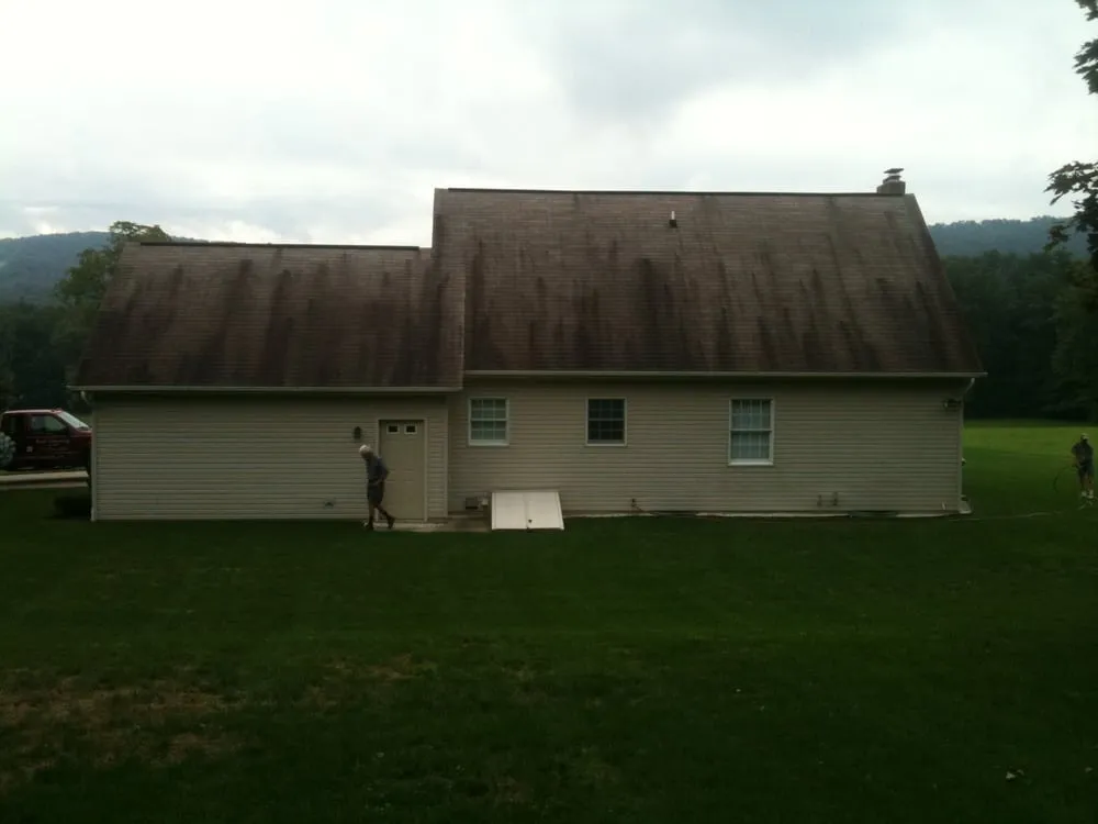 Slide of Roof Cleaning By A&E