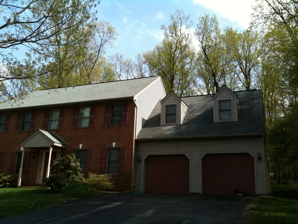 Slide of Roof Cleaning By A&E