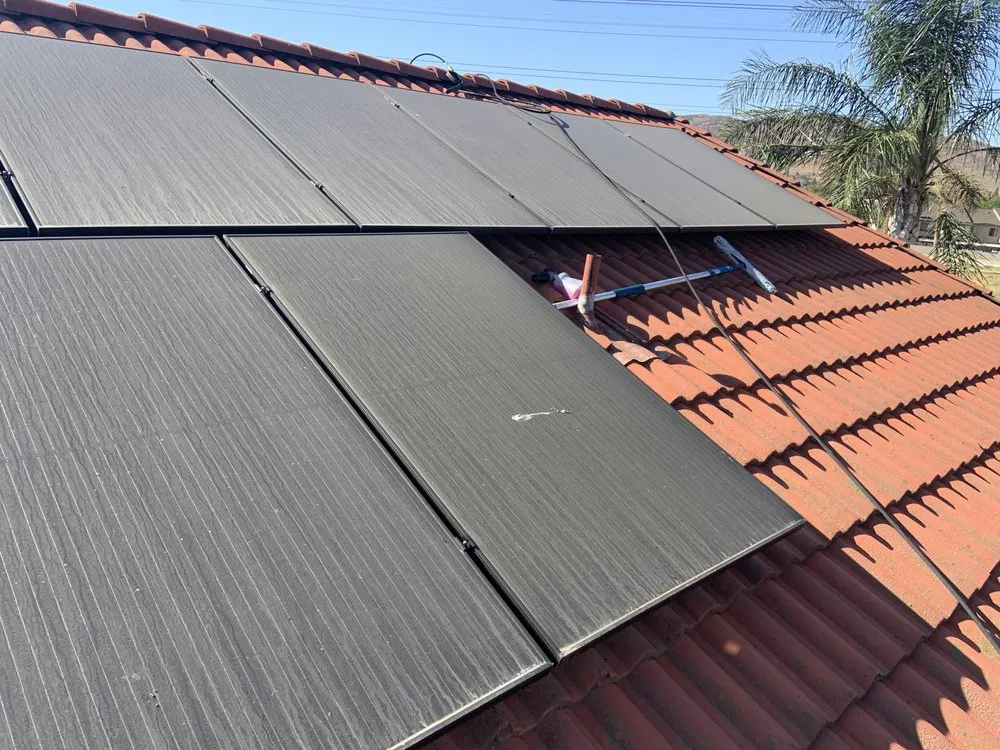 Slide of Roof Doctor Solar Panel Cleaning