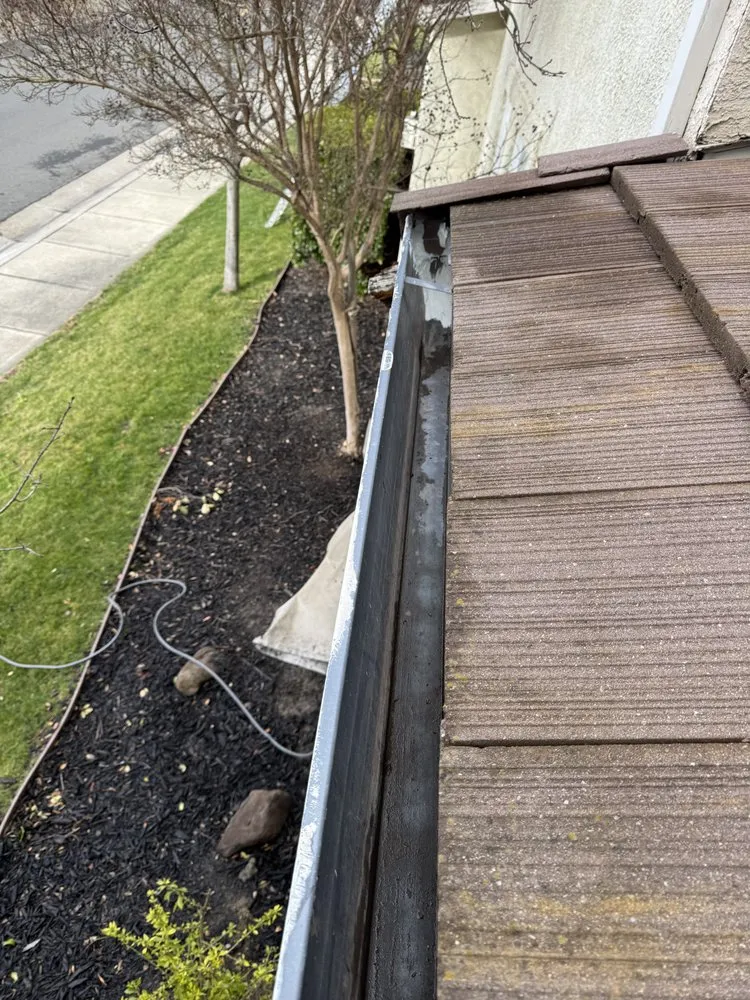 Slide of Roof Gutter Expert