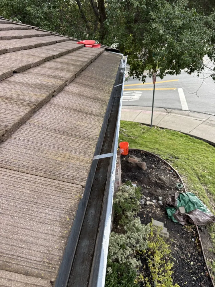 Slide of Roof Gutter Expert