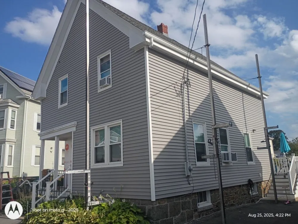 Slide of Roof Guy Boston