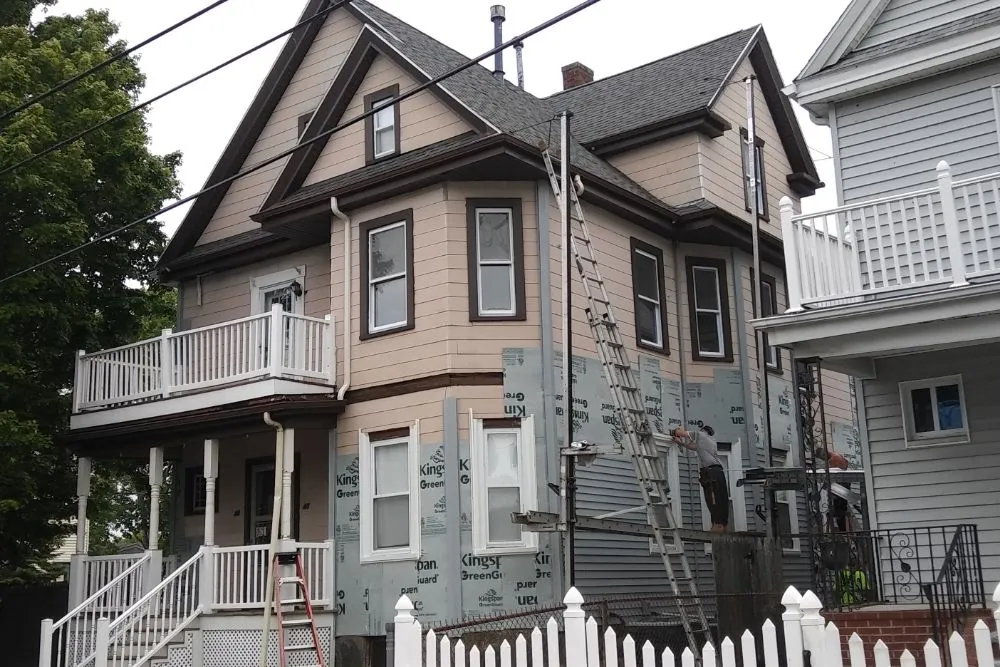 Slide of Roof Guy Boston