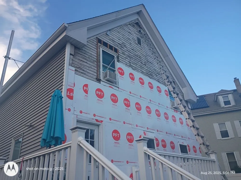 Slide of Roof Guy Boston