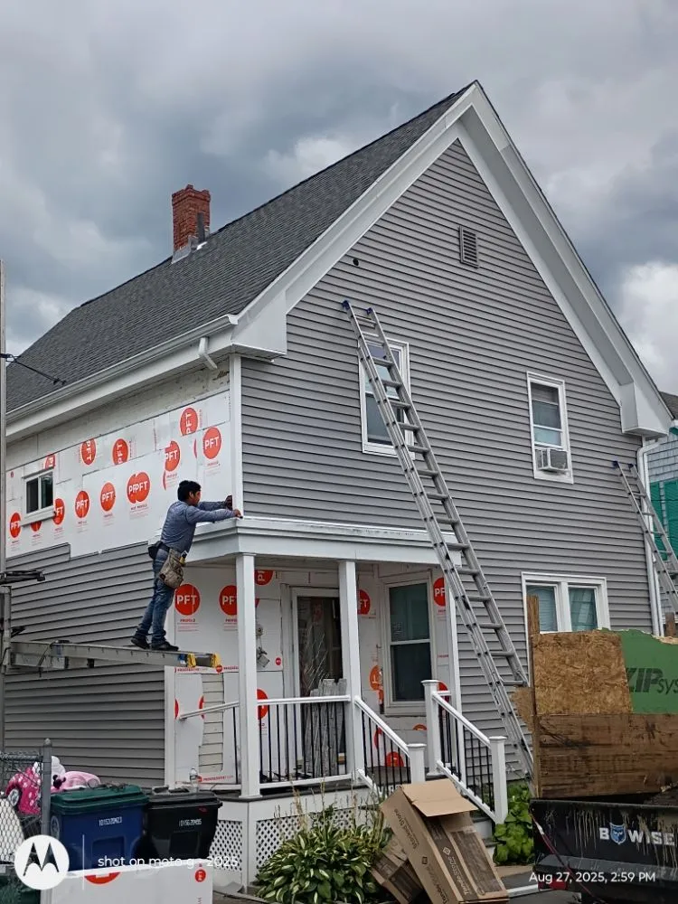 Slide of Roof Guy Boston