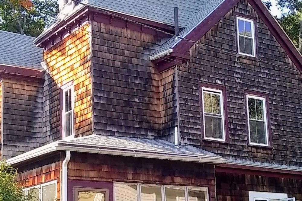 Slide of Roof Guy Boston