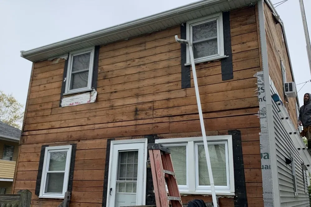 Slide of Roof Guy Boston