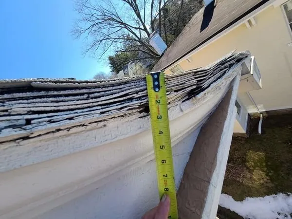 Slide of Roof Inspector NM