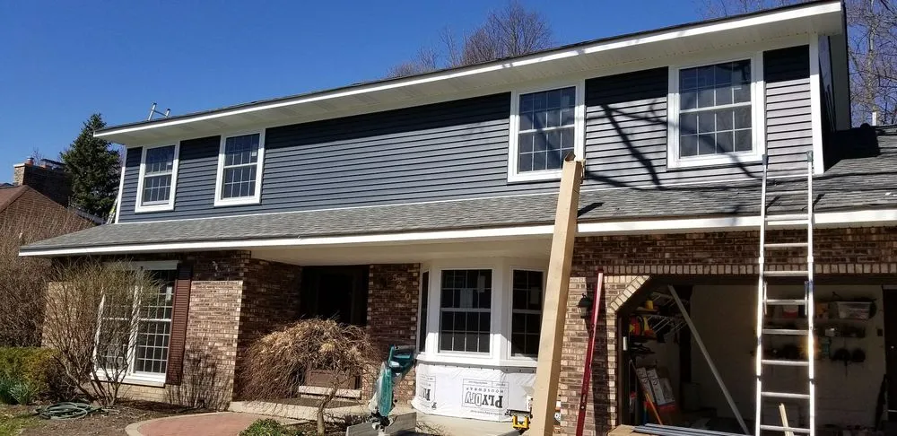 Slide of Roof-Masters and Master-Exteriors