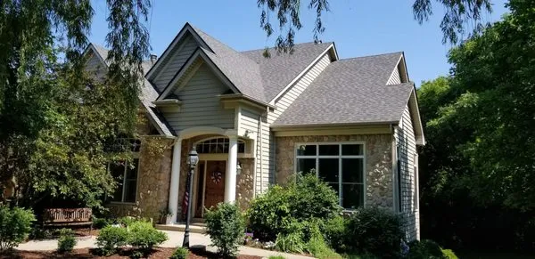 Roof-Masters and Master-Exteriors Logo