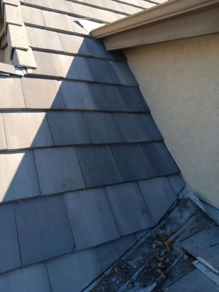 Slide of Roof Masters