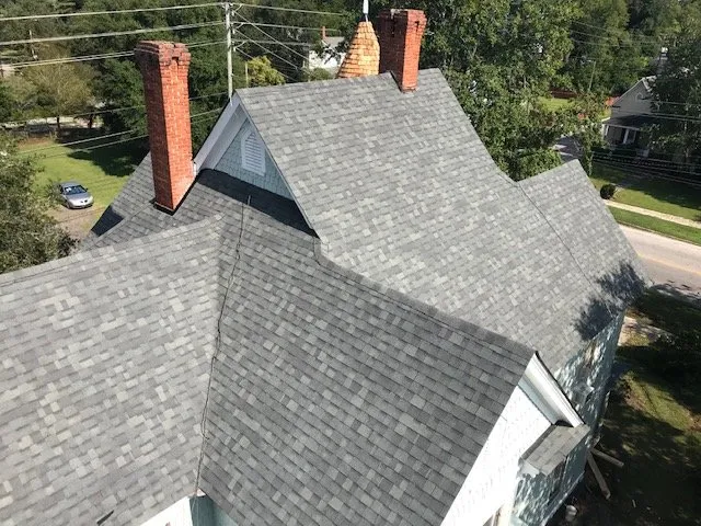 Slide of Roof Masters Roofing Solutions
